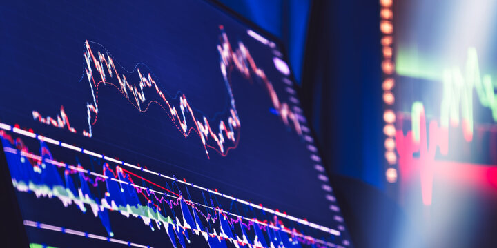 Financial trading screens with stock indicators