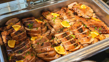 Grilled chicken stir-fried in a sauce decorated with mangoes and vegetables. Arranged deliciously...