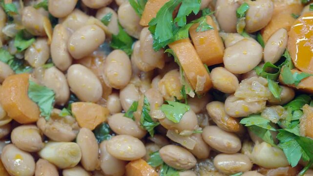 Healthy bean and carrot dish prepared with fresh herbs