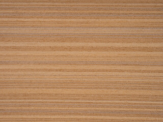 Striped teak veneer exudes a natural warmth with its golden-brown stripes over a canvas of honey...