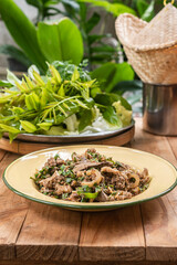 Northern Thai food: Pork Larb in an old-fashioned dish, (Larb Moo)