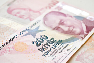 200 Turkish lira banknotes on the table. Business and finance concept.