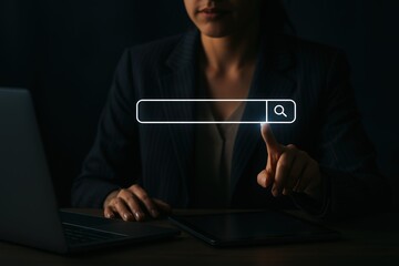 Person interacting with a search bar on a digital device.