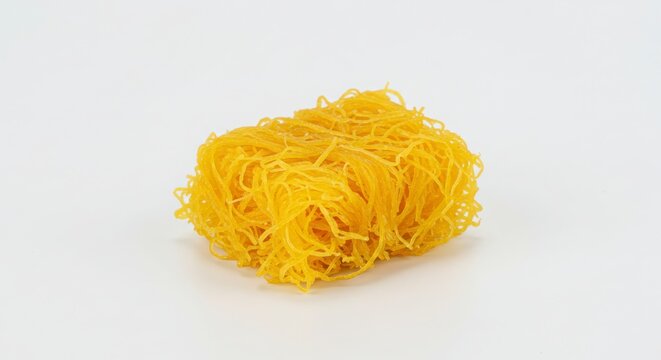 Thai foi thong golden egg thread dessert on a white surface showcasing their texture and shape for dessert and culinary use