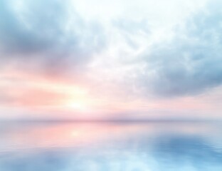 Obraz premium Calm ocean water reflecting a pastel-colored cloudy sky during sunrise or sunset, evoking peace and tranquility