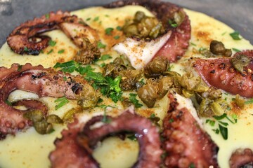Maltese cuisine: grilled octopus with mashed potatoes in Valletta, Malta