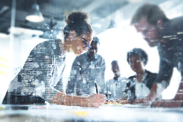 Diverse business team collaborating on project with city overlay meeting collaboration