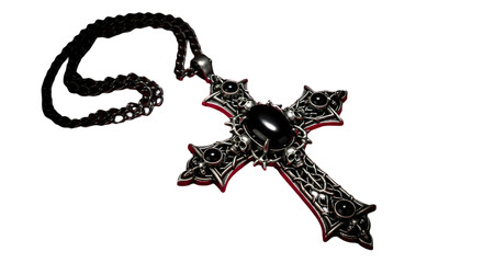 A gothic cross pendant with black stones and skulls on a silver chain against a black background