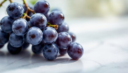 Fresh Grapes with Water Droplets on White Ceramic Surface for Wellness