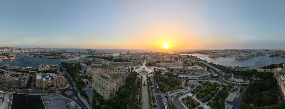 Valletta, Malta aerial drone panorama of historic old city at sunrise