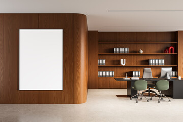 Modern office interior with wood paneling, blank vertical poster mockup, and stylish desk layout for corporate design or branding display concept. 3D Rendering