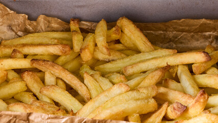 Golden Crispy French Fries on Baking Paper