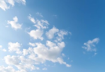 Obraz premium Vast, pale blue sky dotted with fluffy white cumulus clouds, cloud cover, landscape