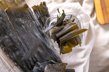 Dried Organic Kelp Dashi Kombu Dashima Seaweed on White Background in 4K Ultra HD