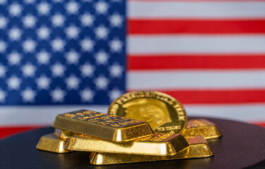 f hundred dollar bills with gold bars