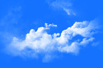 Bright white cumulus clouds floating serene against a vibrant clear blue sky