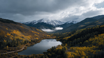 Amazing Autumn Mountain Valleys from Above with snowy mountains at backdrop