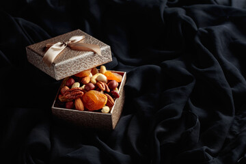 Dried fruits and nuts in a gift box.