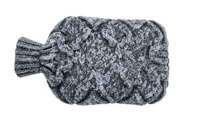 Gray knitted hot water bottle covered in frost and snowflakes isolated on the transparent background for winter comfort and health concepts