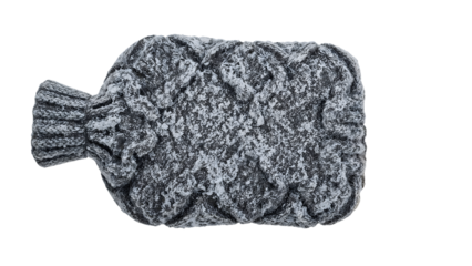 Gray knitted hot water bottle covered in frost and snowflakes isolated on the transparent background for winter comfort and health concepts