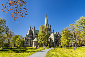 Grand Gothic Cathedral Architecture with Sunlight on a Clear Blue Sky, Nidaros, Trondheim, Norway