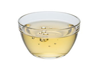 Clear glass bowl of white wine vinegar, isolated on transparent background.