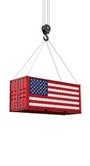 Shipping container with the American flag being lifted by a crane for international trade and global commerce