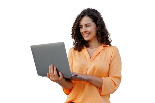 Curly-haired woman wearing orange shirt, working on laptop with friendly smile against transparent backdrop