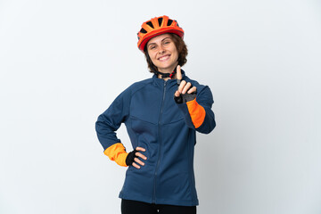 Young English cyclist woman isolated on white background showing and lifting a finger