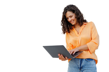Young woman smiling and typing on a laptop, immersed in work, isolated on a transparent background,...