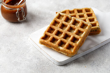 Waffles empty close up on white board with chocolate paste
