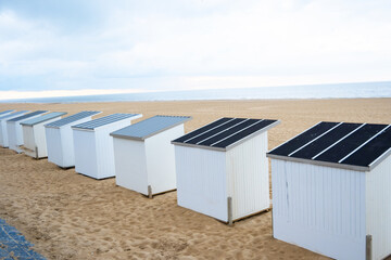 Panorama of beach huts and sand dunes, Ostend.  Sea coast, Belgium.