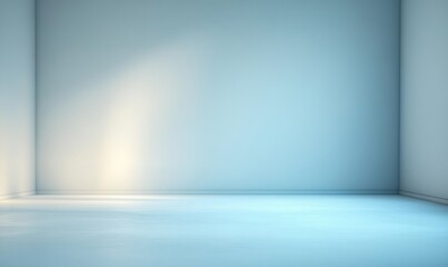 Empty room with smooth blue walls and floor softly illuminated by natural light creating a calm and serene atmosphere