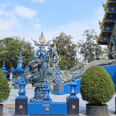 Wat Rong Suea Ten,Ornate architecture, Buddha and figures in the Blue Temple in Chiang Rai, Thailand, Asia