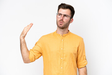 Young caucasian man isolated on white background with tired and sick expression