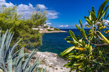 Coastal path to Bulicicev beach on Ciovo island in Croatia, azure water, empty beaches, beaches hidden in the rocks Croatia