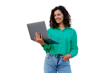 Female professional working on laptop, curly-haired, wearing green top, transparent backdrop