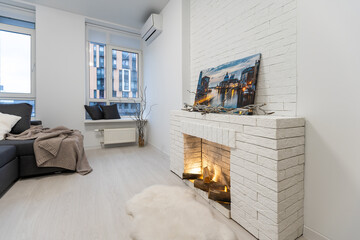 Bright living room interior with fireplace