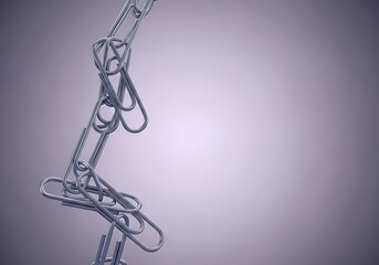 Obraz premium Paperclips are linked together to form a chain, symbolizing connection and interdependence