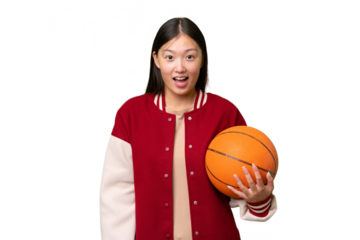 Young basketball player asian woman over isolated background with surprise facial expression