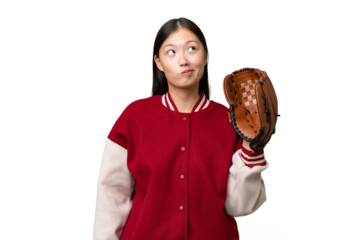 Young asian woman with baseball glove over isolated background and looking up