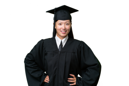 Young university graduate Asian woman over isolated background posing with arms at hip and smiling