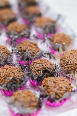 Closeup of Brazilian chocolate fudge balls known as Brigadeiros, covered in sprinkles for a birthday party celebration.