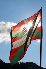 Basque flag waving in the air in a sunny day