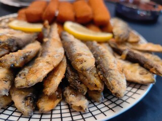 Cold fasting appetizer - Frying small fish. European sprat, sardine, garvie, russlet 