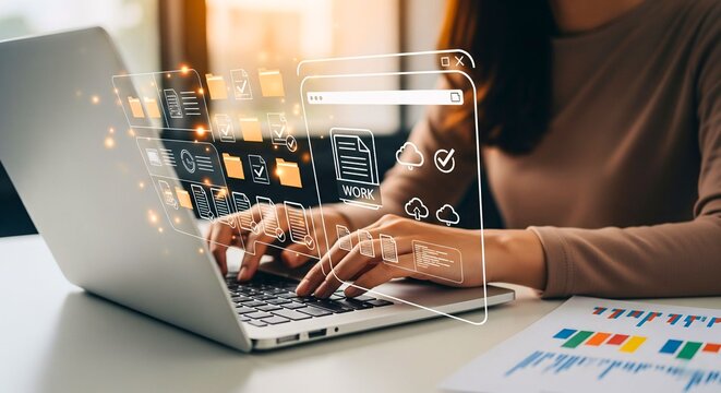 Data at Your Fingertips: A woman focused on her work as she interacts with a digital interface on a laptop