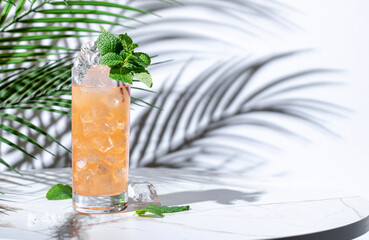 Salty ginger-ade non-alcoholic cocktail drink with lemon juice, dates, salt, cumin, ginger beer and mint