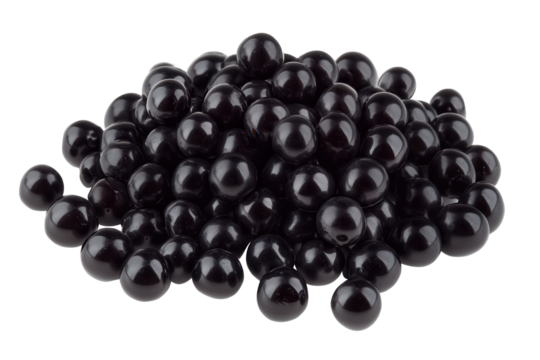 Black tapioca boba pearls piled together on a transparent background for food and beverage preparation or decoration purposes