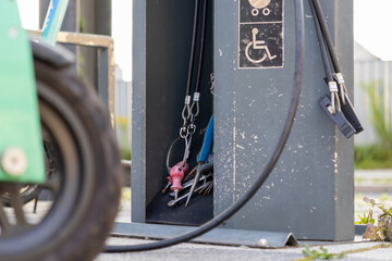Public service station offering essential tools for bicycle repair and maintenance, featuring...