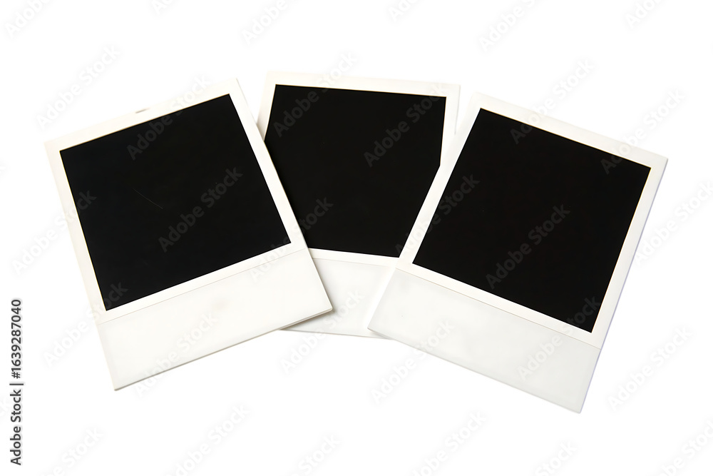 Poster three blank polaroid frames with black center arranged on a surface in a slightly overlapping patter